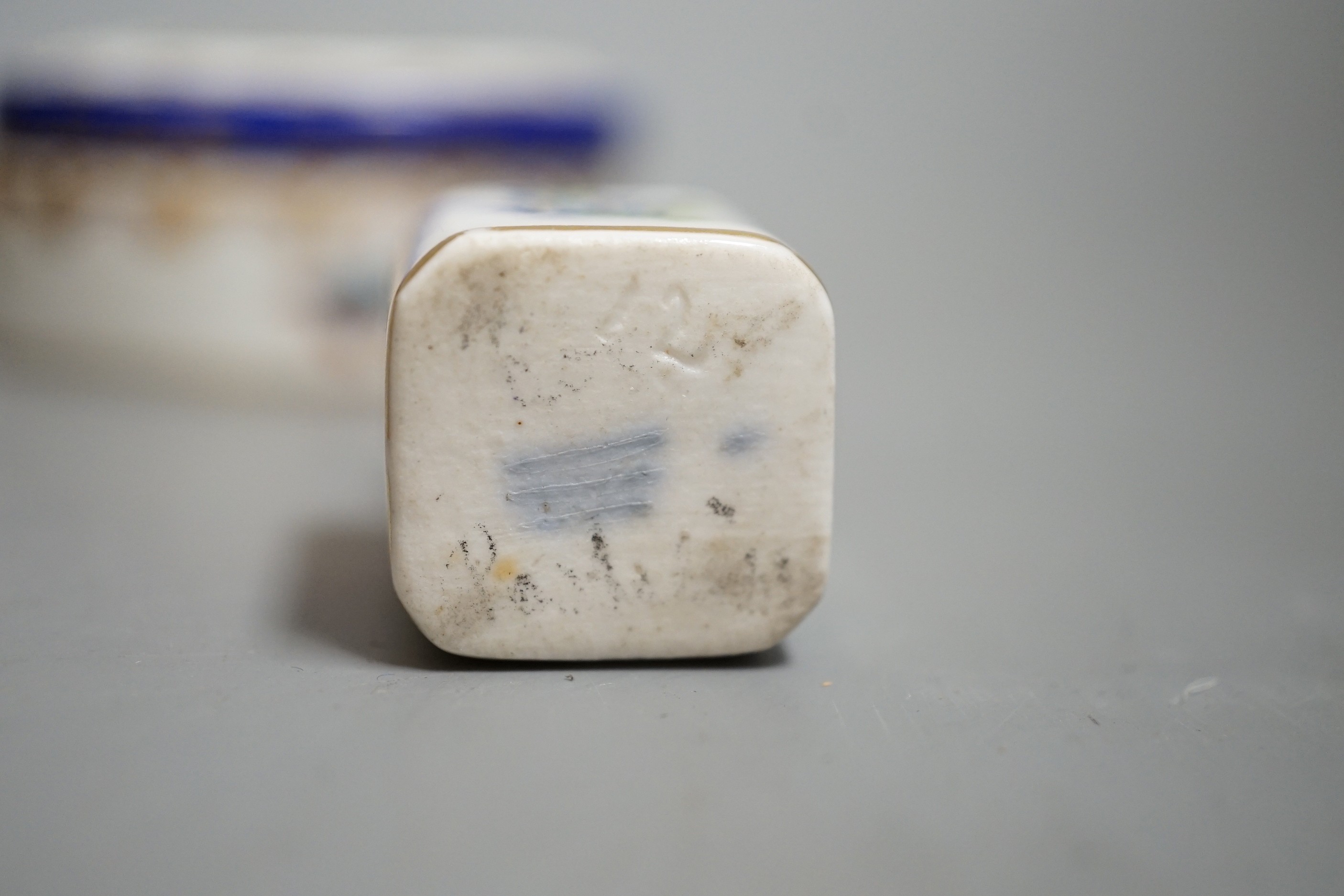 A Continental circular porcelain pot and cover, a plaque and a matchbox cover